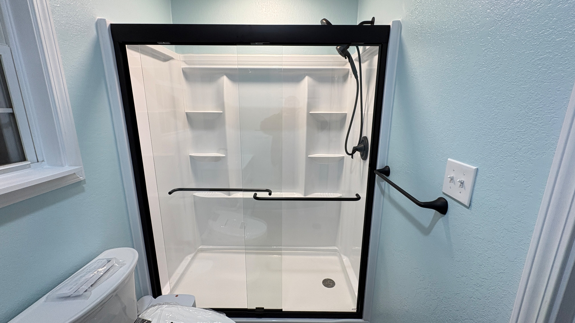 Newly remodeled bathroom with white walk-in shower in Georgetown, KY