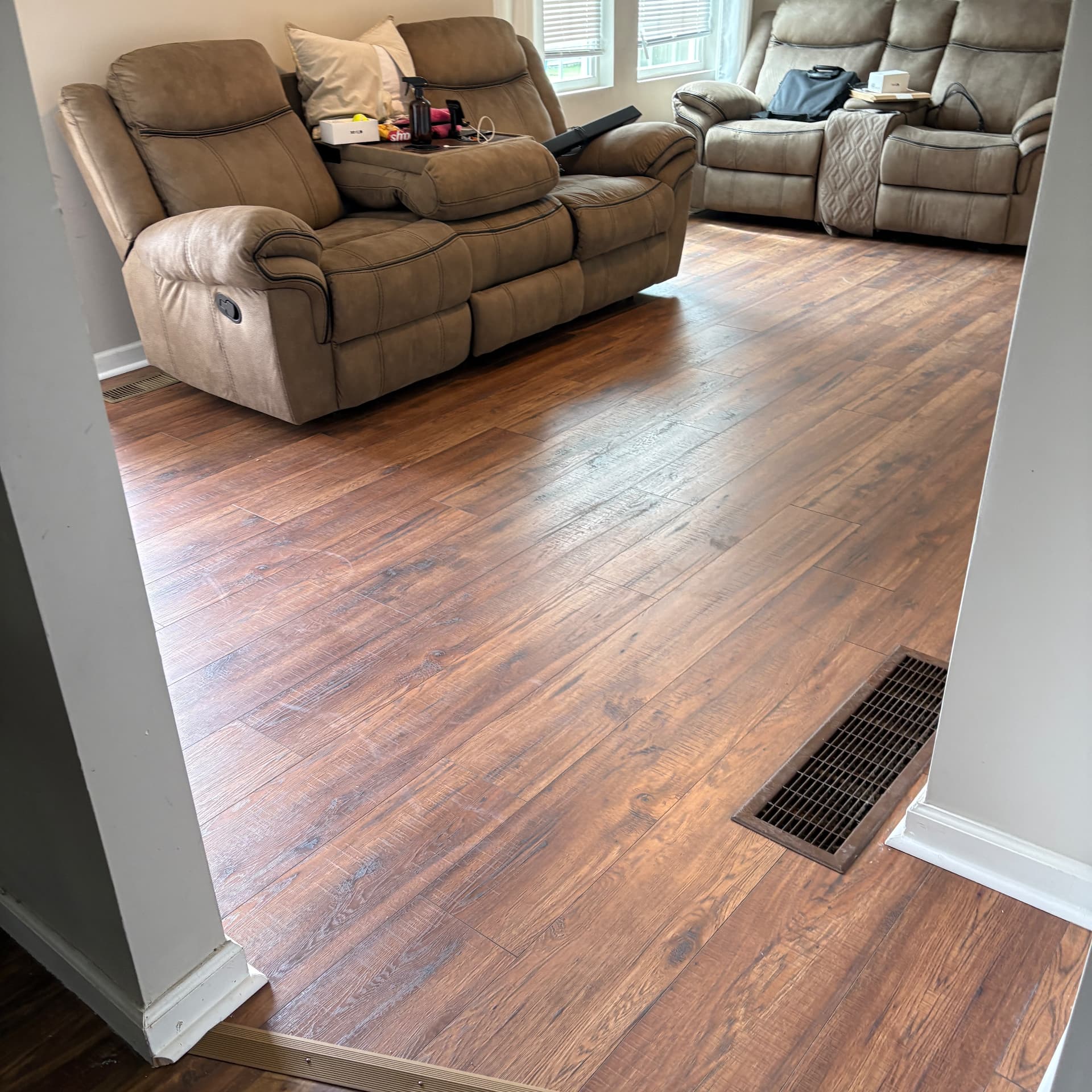 Newly installed wood-look plank flooring in a living room in Frankfort, KY